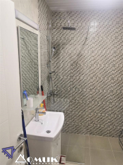265877